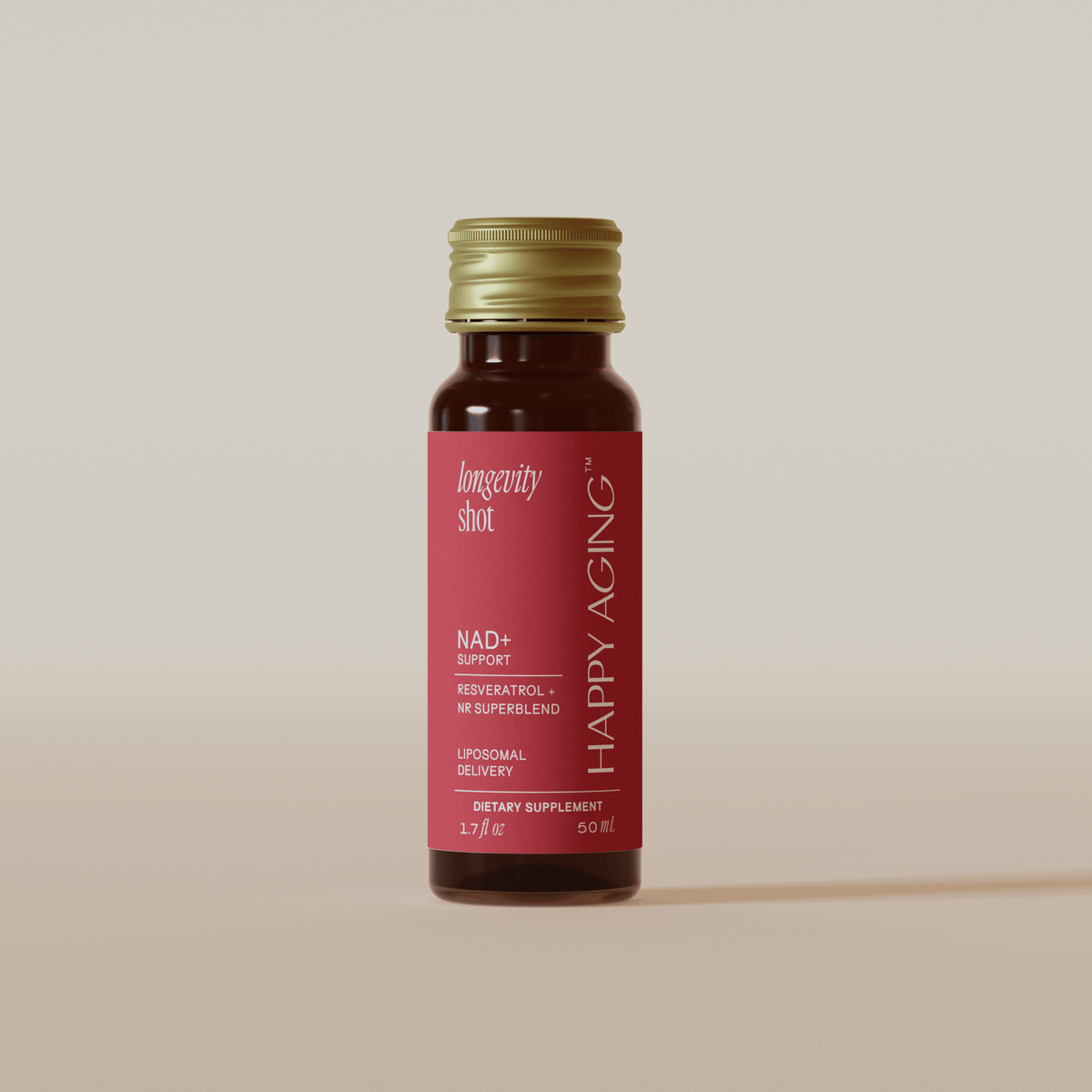 Close-up of gold cap on Longevity bottle with pink longevity shot label