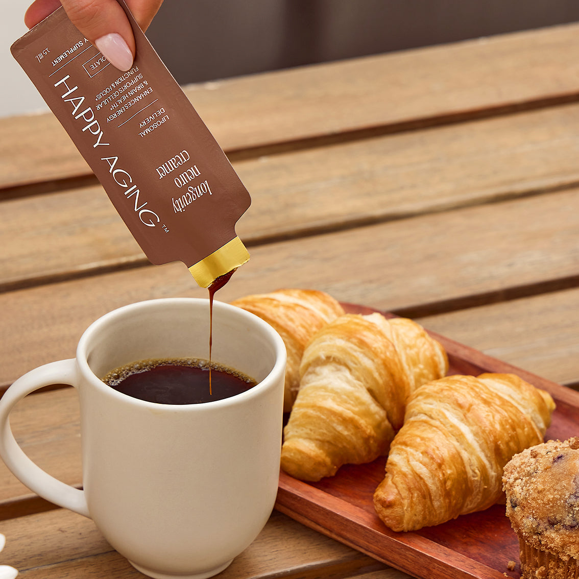 Close-up of a single green leaf against a white background.