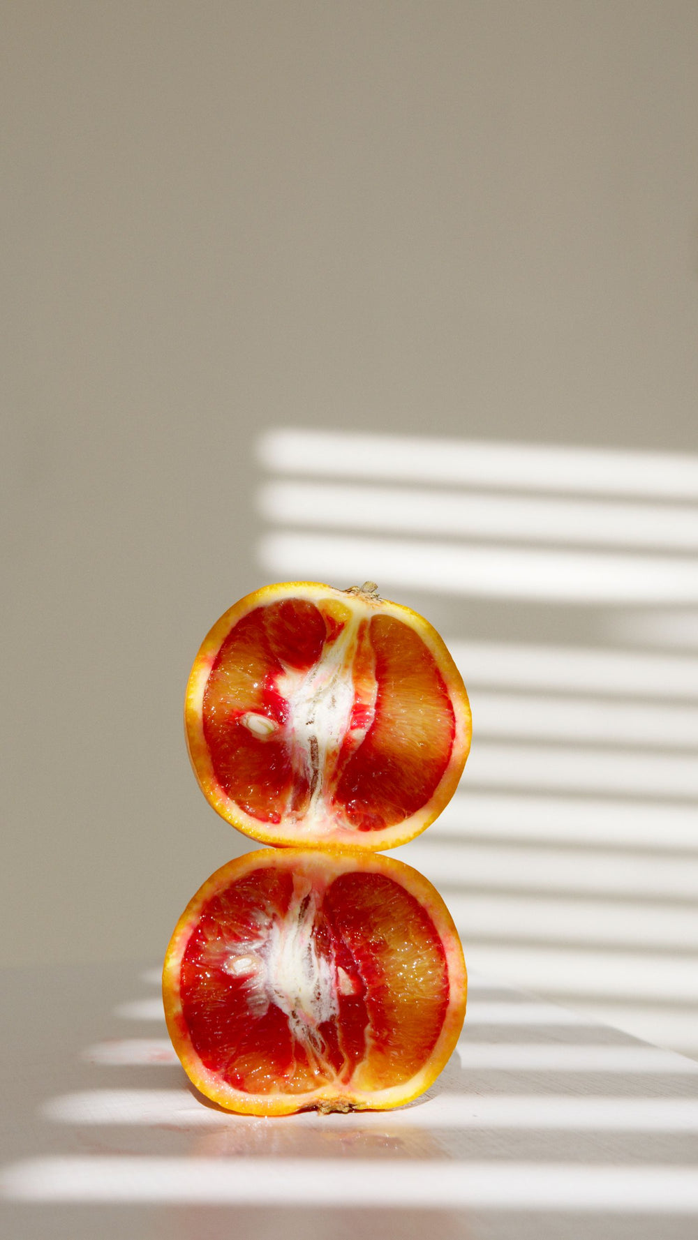 Halved Moro blood orange showing deep red flesh